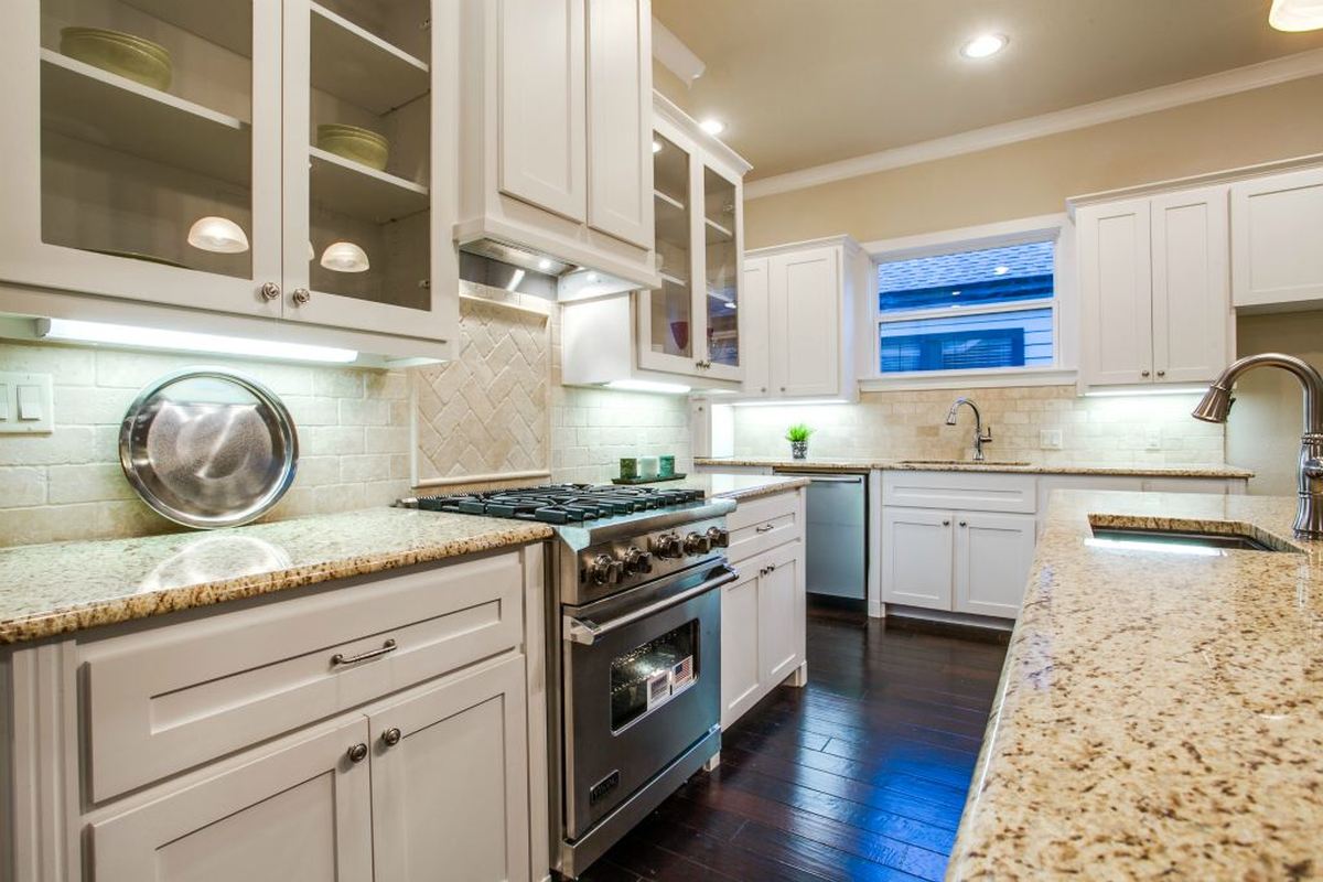 Range wall and tile backsplash.