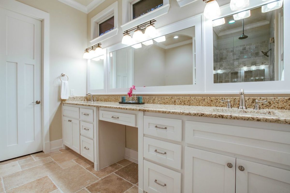 A double vanity with a seated run between the two sinks.